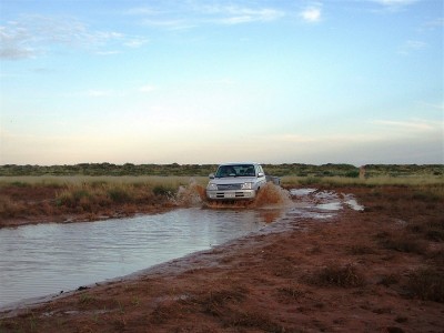 Dave towing the tinny out of the Bay of Rest track (bit wet that year)