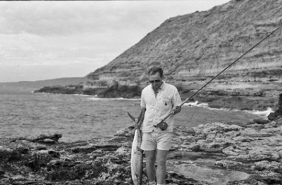 Max with a mackerel off the rock named for him.jpg